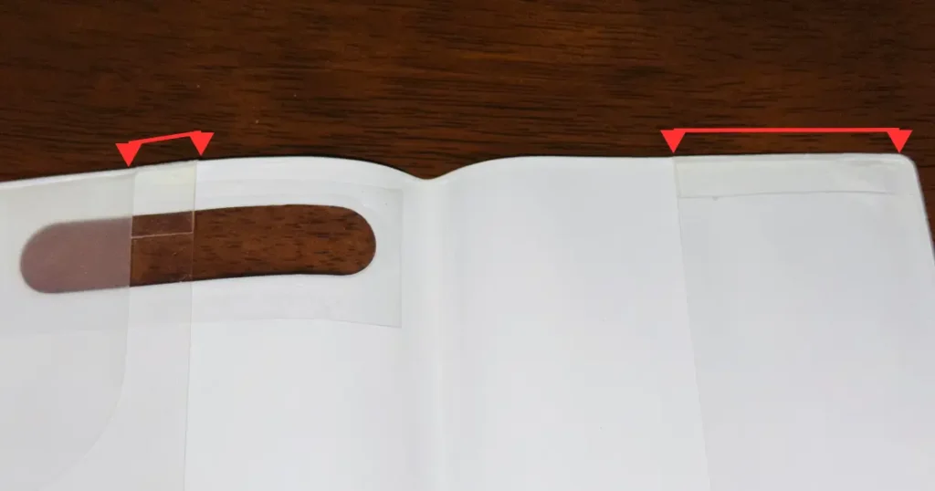 シール帳カバーの破れを便利テープで補修した様子